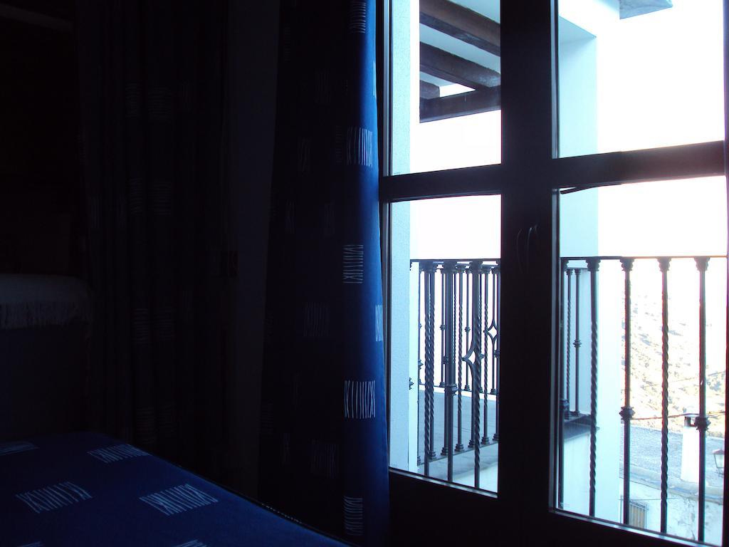 Apartamentos El Mirador Bérchules Pokoj fotografie